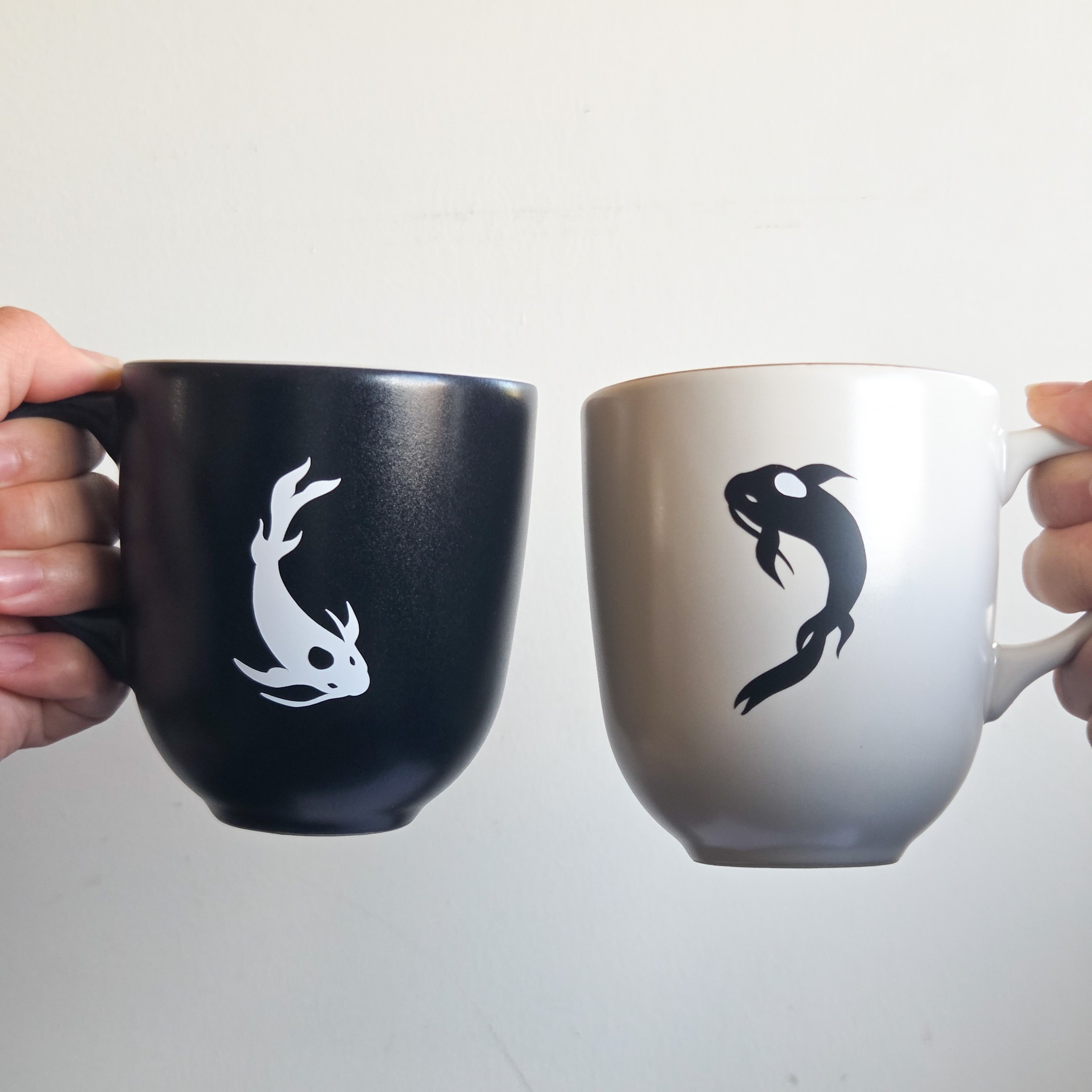 tui and la set of 2 mugs