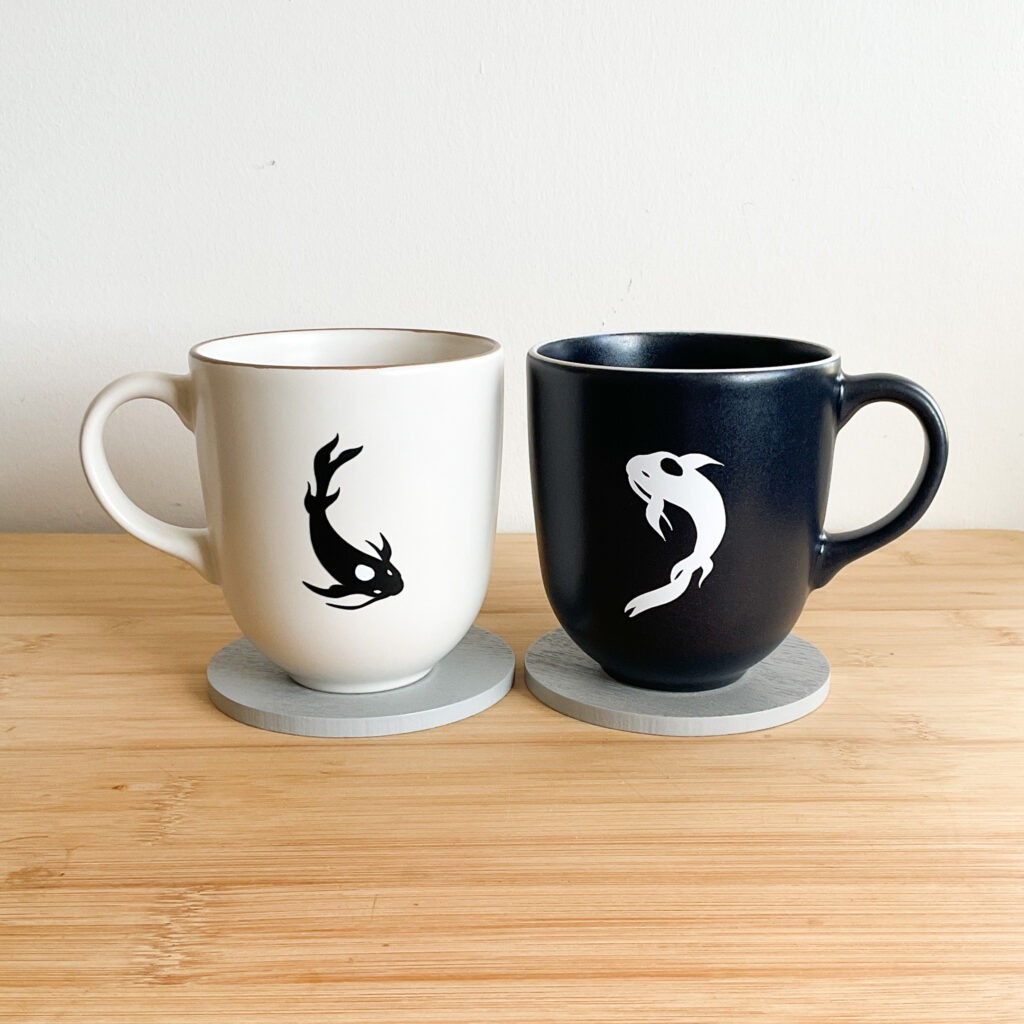 tui and la set of 2 mugs